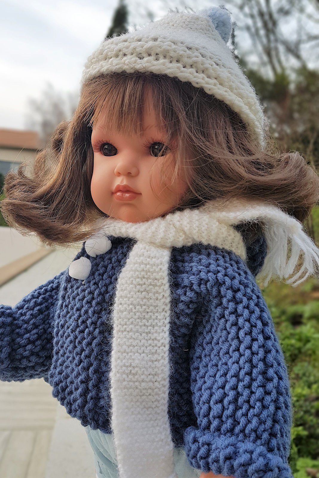 Veste en laine pour les poupées cerise et capucine