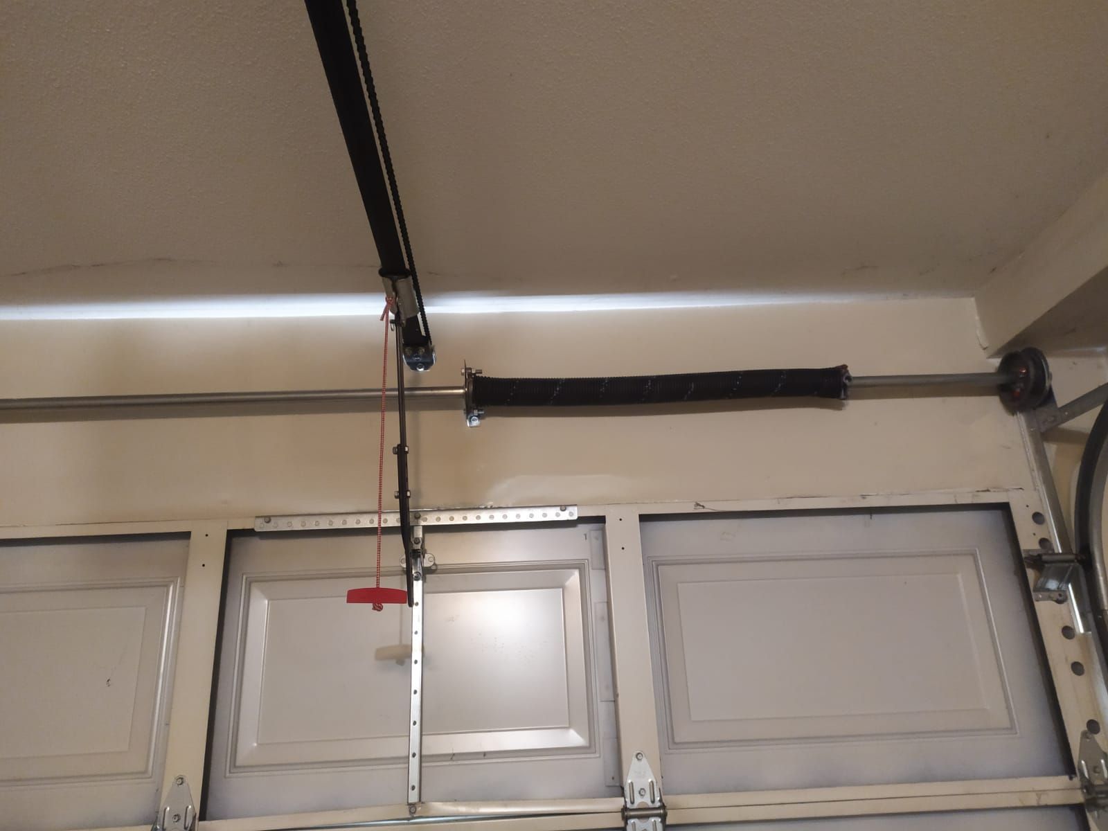 Torsion vs Extension Spring What Are the Differences Titan Garage Doors