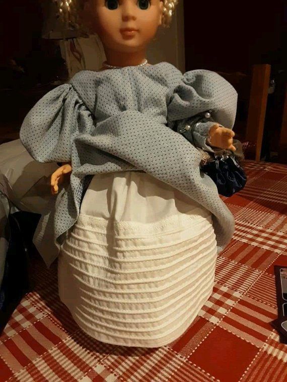 Détail de la poupée